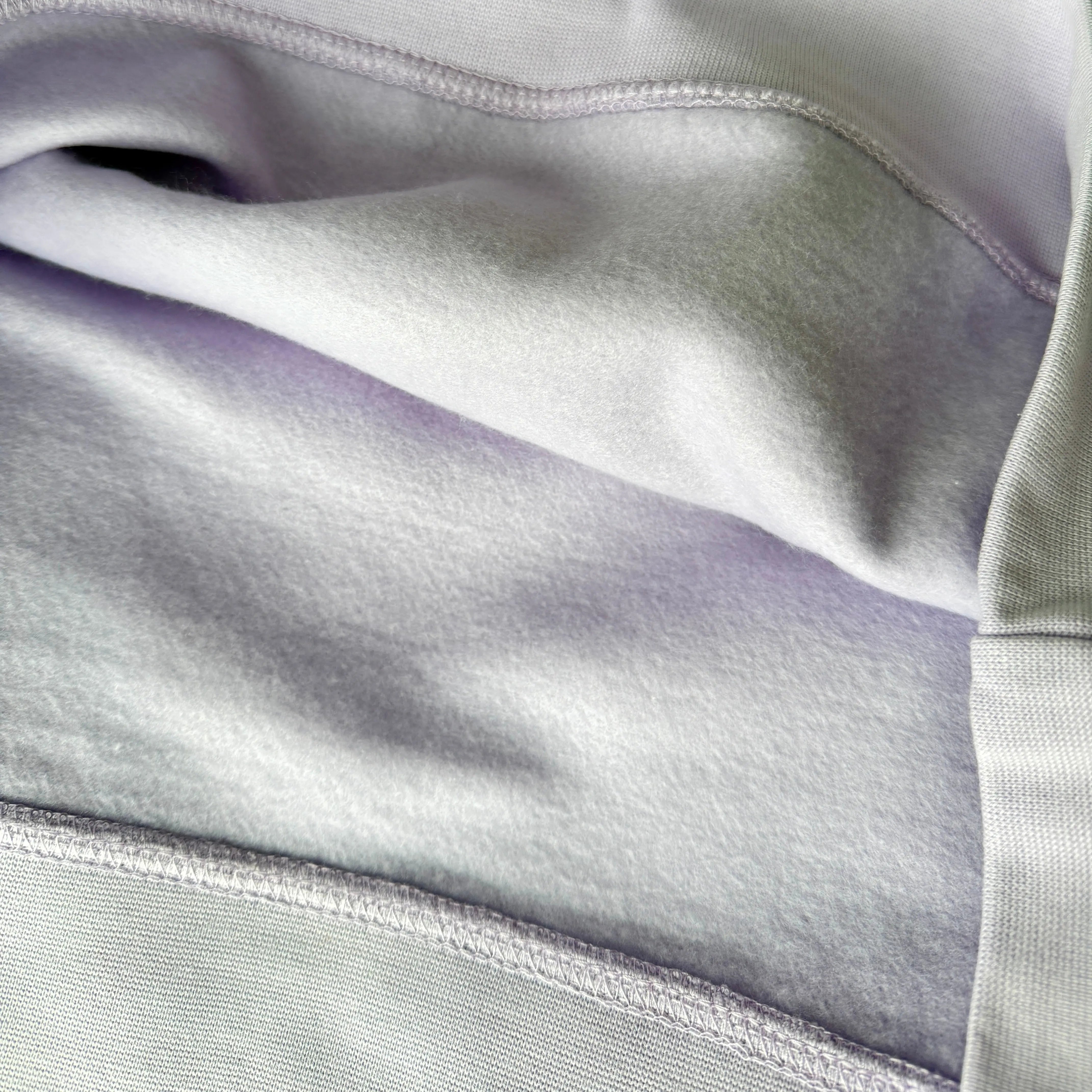 Close-up of gray fabric with a focus on texture and pattern.