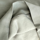 Close-up of a textured fabric with a focus on texture and color.
